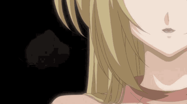a close up of a blonde anime girl 's face