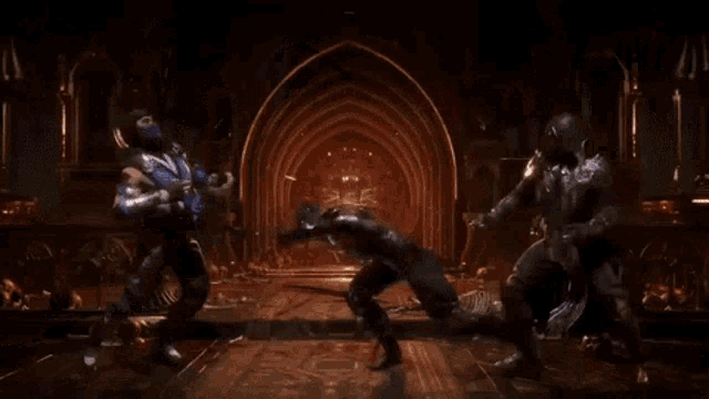 two men are fighting in a video game and one of them is glowing in the dark .
