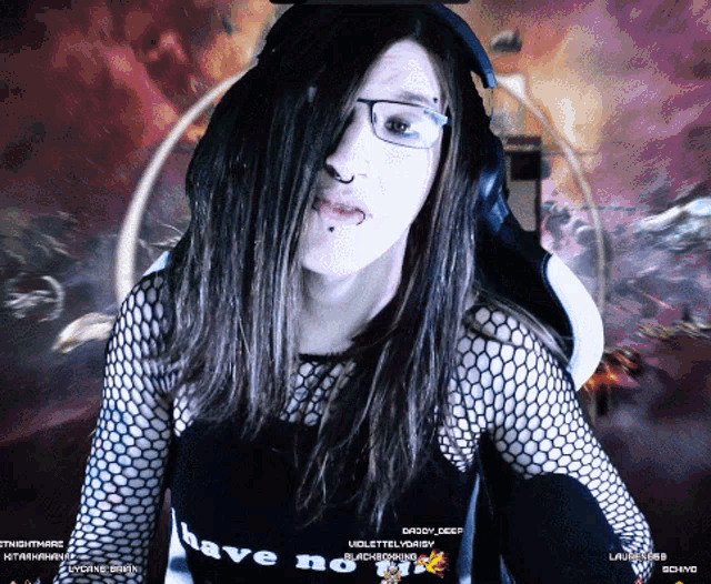 a woman wearing glasses and a shirt that says have no