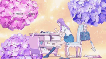 a girl is kneeling down in front of a desk with purple flowers in the background