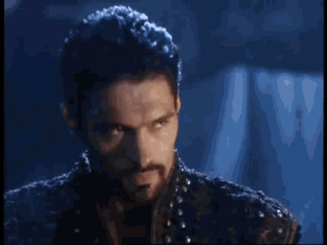 a man with a beard says it 's ok you do n't have to answer
