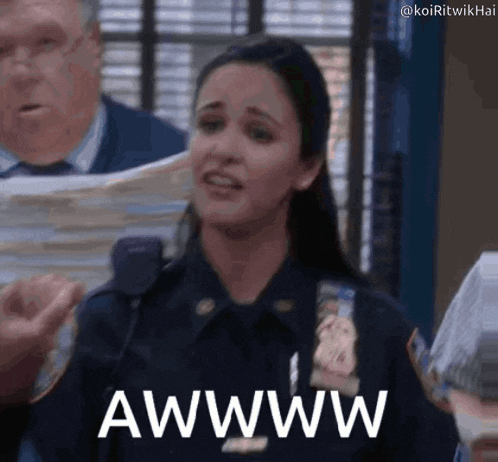 a woman in a police uniform is making a funny face and saying awwww .