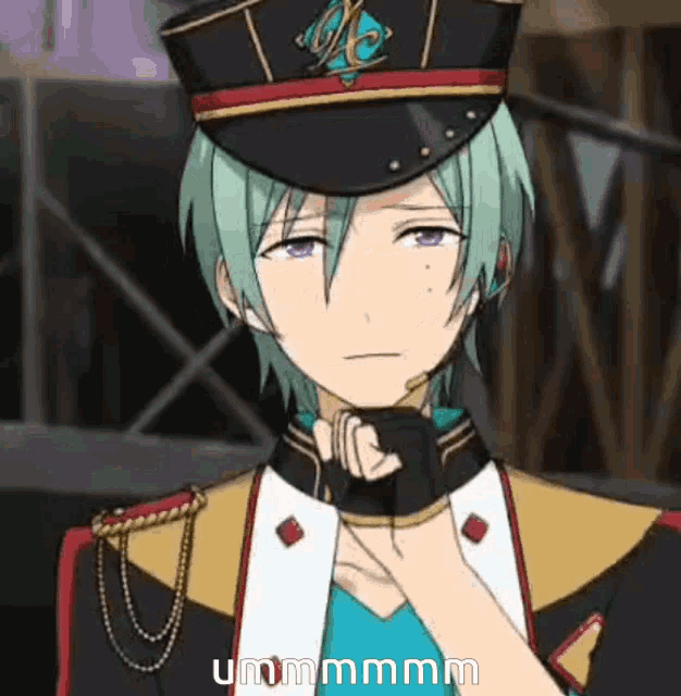 a man with green hair is wearing a black hat and gloves and making a face .