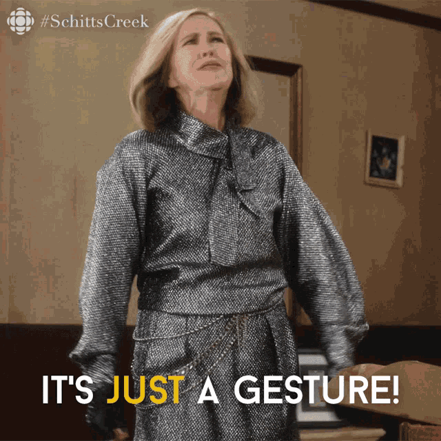 a woman says it 's just a gesture in yellow