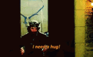 a man in a knight 's armor says " i need a hug "