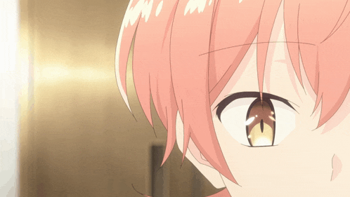 a close up of a girl 's face with pink hair and a yellow eye