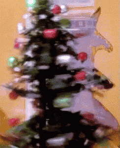 a blurry picture of a christmas tree with decorations on it