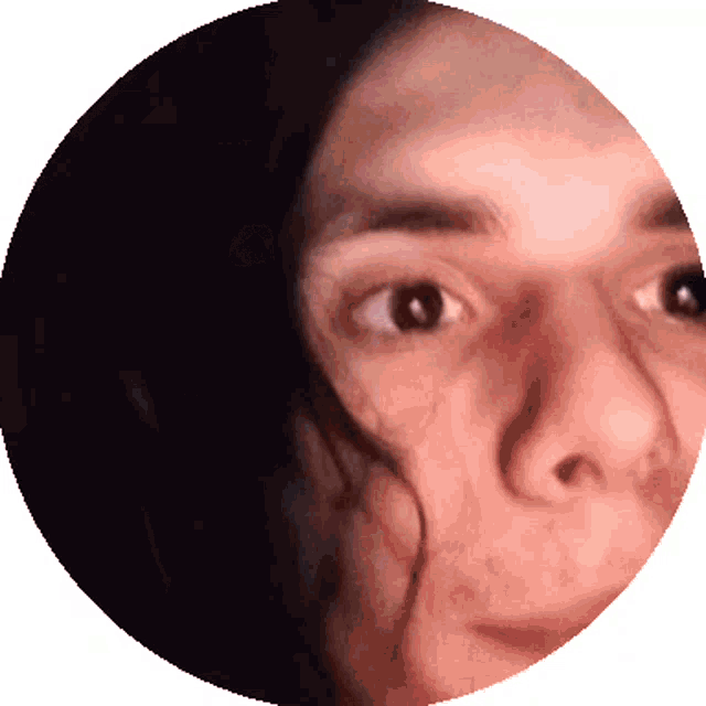 a close up of a woman 's face in a circle with a white background