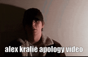 a man in a hat is standing in front of a wall with the words alex kralie apology video below him .