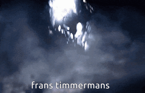 a dark cloudy sky with the words frans timmermans in white letters