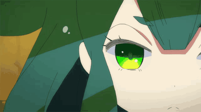 a close up of a person 's face with green hair and green eyes