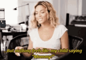 a woman is sitting in a chair with the words but nothing feels like my child saying mommy