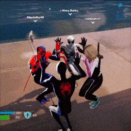 a group of people in spider-man costumes are playing a video game .