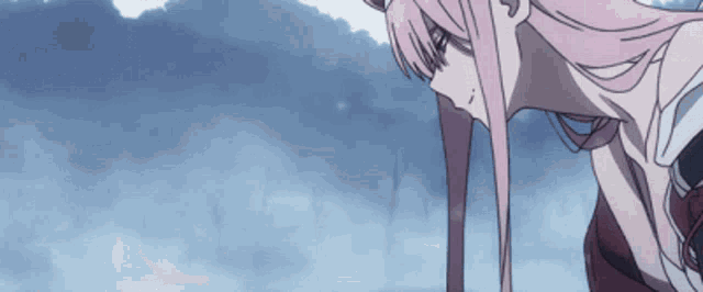 a girl with long pink hair is looking down at something