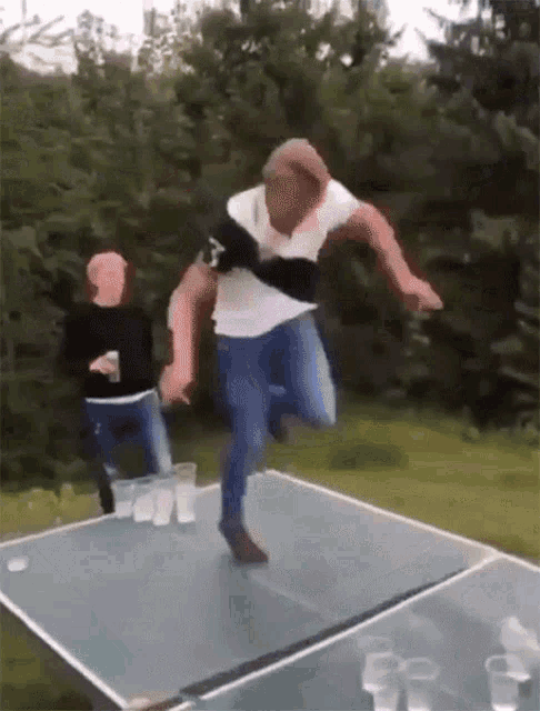 Destroying A Ping Pong Table Slam GIF - Destroying A Ping Pong Table Slam Dancing GIFs