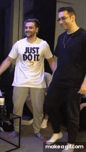 a man in a just do it shirt is dancing