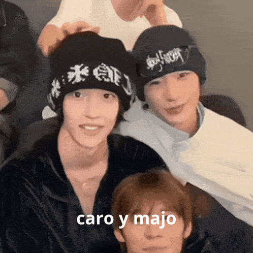 a group of young men wearing beanies with the words caro y majo written on them