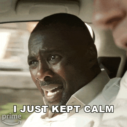 a man sitting in a car with the words " i just kept calm " below him