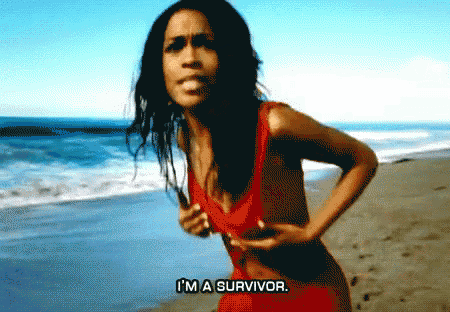 a woman in a red bathing suit is running on the beach and says i 'm a survivor