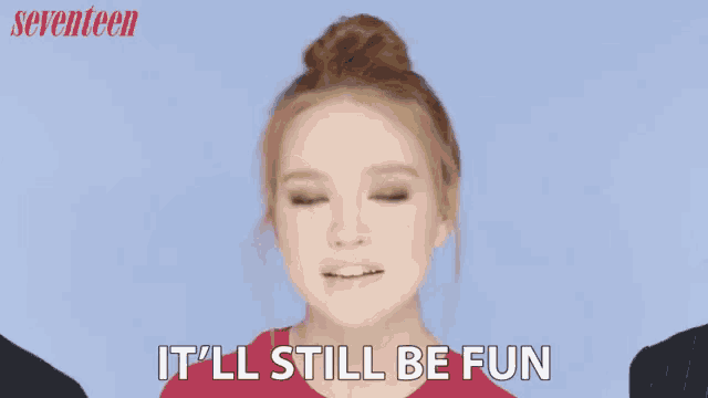 a woman says " it 's gonna be great " in front of a blue background