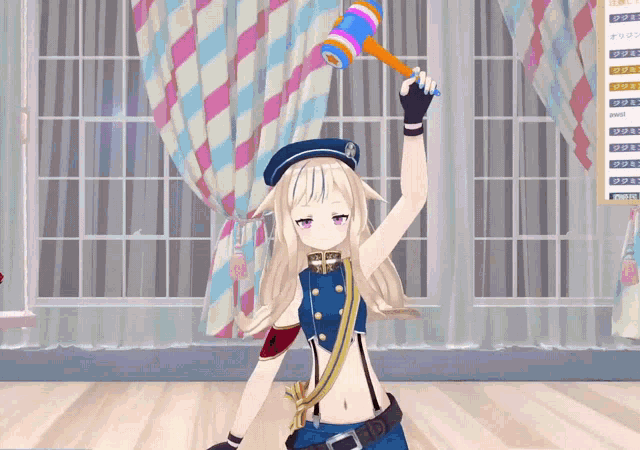 a girl in a blue hat is holding a colorful hammer in her hand