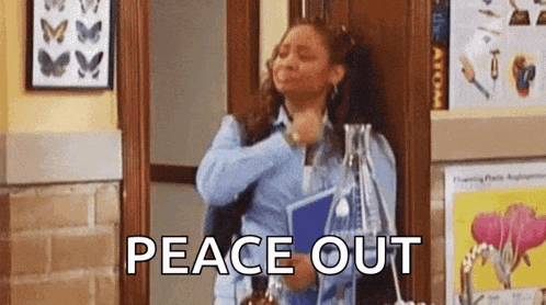 a woman is standing in a doorway holding a book and a bottle of water and says peace out .
