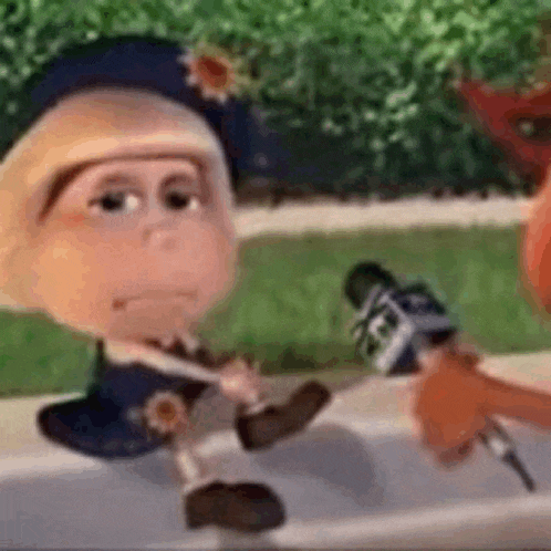 a cartoon character is talking into a microphone while sitting on a sidewalk .