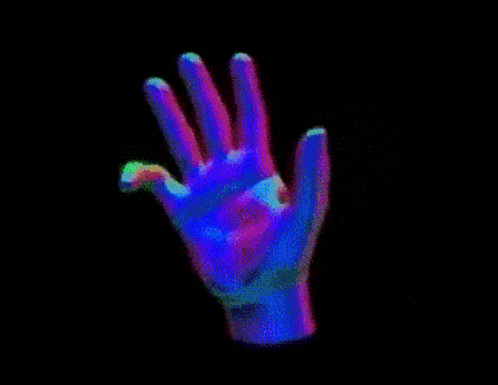a glow in the dark hand is making a peace sign .