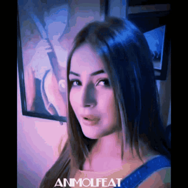 an animated image of a woman with the word ammolfeat written below her