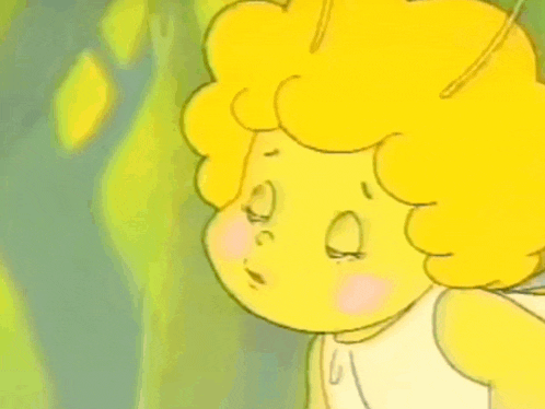 a close up of a cartoon character with a yellow curly hair and wings .