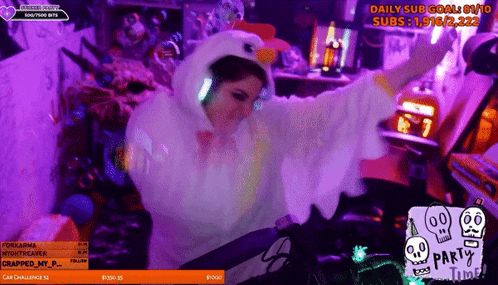 a woman in a chicken costume is dancing on a purple screen