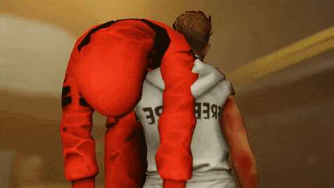 a man in a red jumpsuit is standing next to a man in a white shirt with the number 39 on the back
