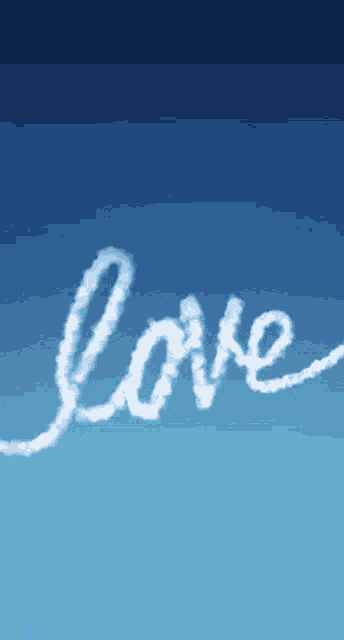 the word love is written in the clouds on a blue background