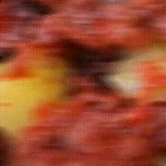 a close up of a red and yellow abstract painting