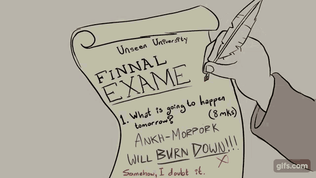 a person is writing on a piece of paper that says finnal exams