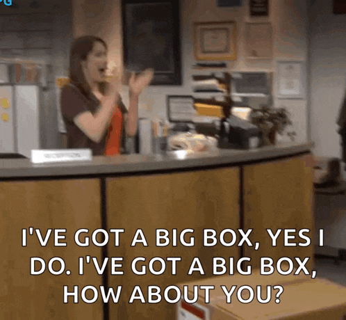 a woman behind a counter says " i ve got a big box yes i do "