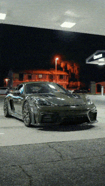 a car is parked in front of a gas station that says clarion