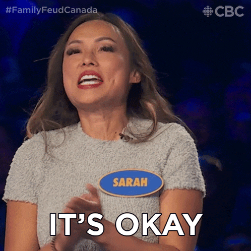 a woman with a name tag that says " sarah " on it