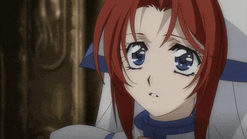 a girl with red hair and blue eyes is wearing a white shirt