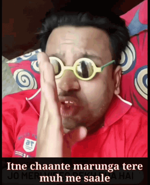 a man wearing sunglasses is laying on a bed and says itne chaante marunga tere