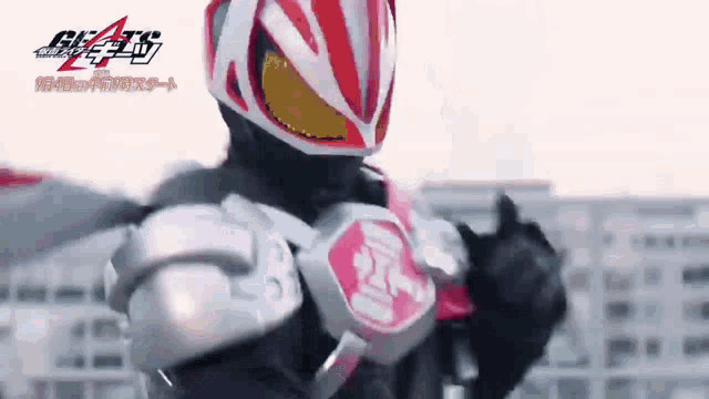 a close up of a person wearing a helmet and a costume