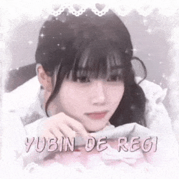 a close up of a girl 's face with the words yubin de regi written on the bottom .