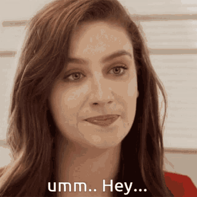 a close up of a woman 's face with the words umm hey on the bottom