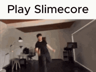 a man is dancing in a room with the words play slimecore written above him