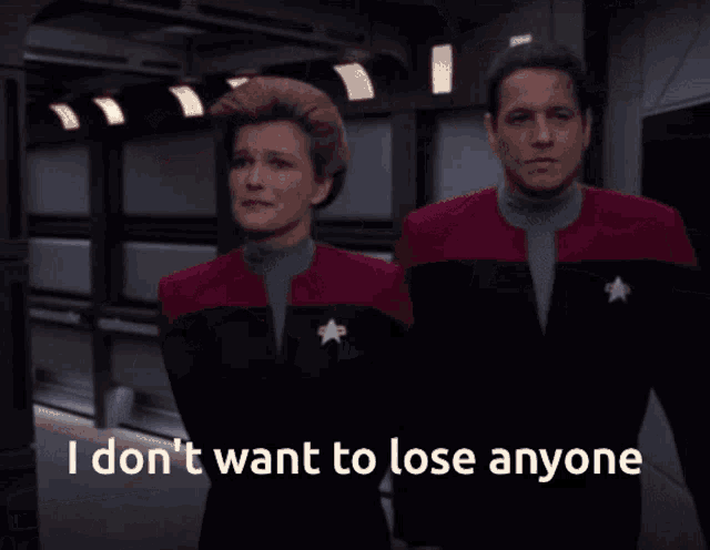 a man and a woman standing next to each other with the words " i don t want to lose anyone "