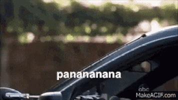 a close up of a car windshield with the words pananana on it