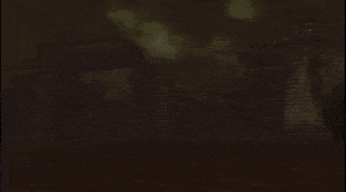 a gray background with a few white triangles