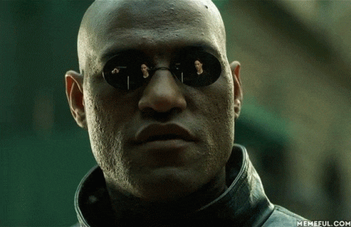 a close up of a man wearing sunglasses with memeful.com on the bottom right