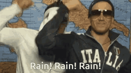 a man wearing sunglasses and a jacket that says italia on it