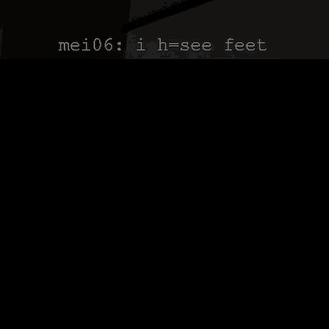 a dark room with a sign that says mei06 i h see feet